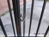 Someone Has Removed The Coat Hanger And Then Flimsily Secured The Gate!