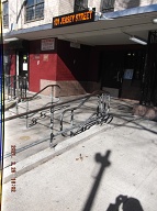 The bottom right dark shadows are me taking this picture and the pole and camera at the front of this notorious building. The " brown spots " are dog shit which are everywhere all over this entire housing development!!